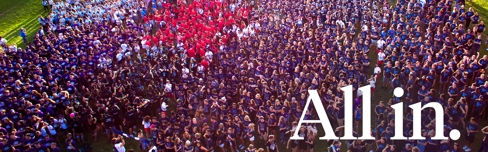 Western students in a crowd. Text: "All in."