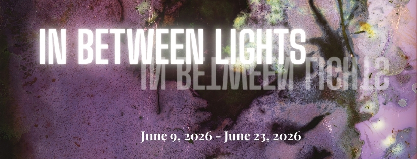 title: in between lights with a hazy purple background